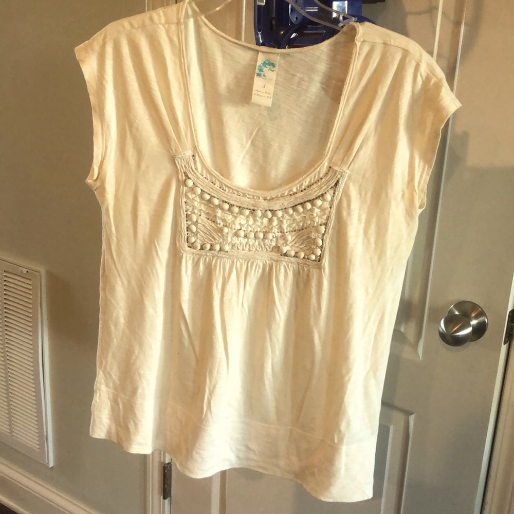 Anthropologie size small (oversized) off white top